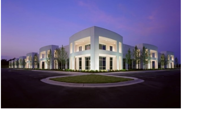 Photograph of a modern industrial distribution warehouse building.